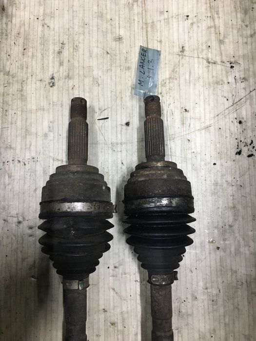 Полуось привод шрус Mitsubishi Colt Lancer 1.3 БЕНЗИН (ПЕРЕДНЯ ДОВГА).