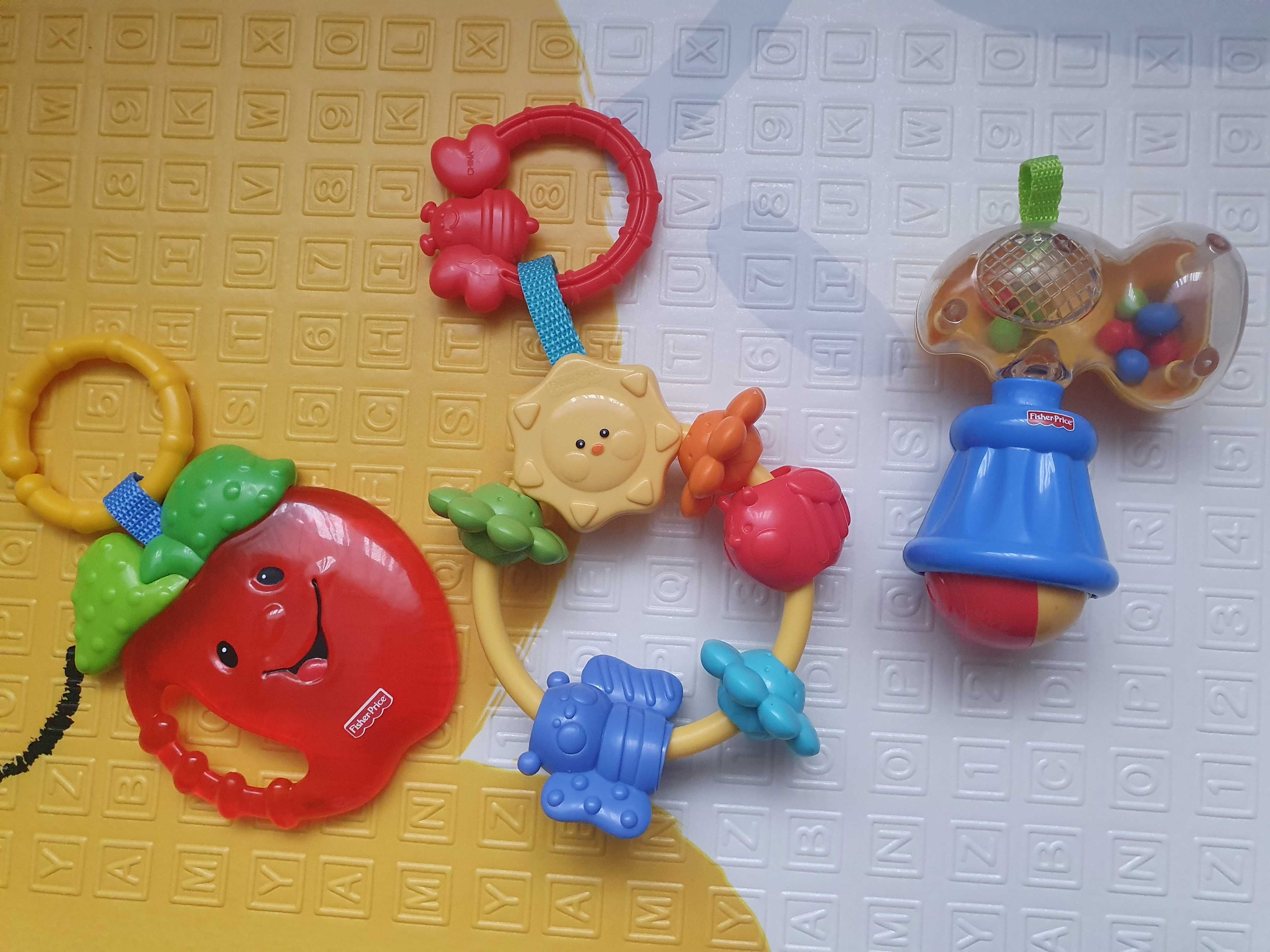 Fisher price брязкальця