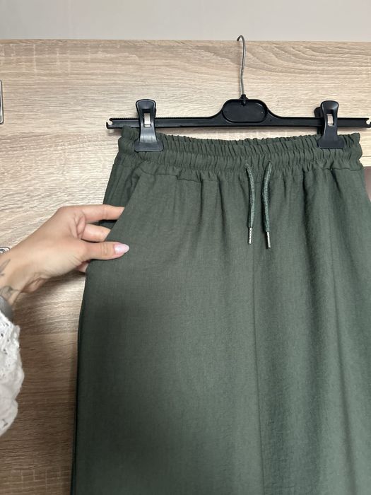 Luźne spodnie szerokie khaki dzwony luźna nogawka