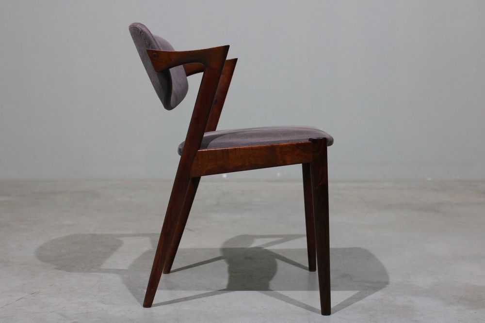 Conjunto de 6 cadeiras Kai Kristiansen modelo 42 em pau santo