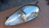 Fiat Punto grande reflektor lampa lewa lewy eu