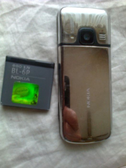 6700-c1 srebna.Nokia E66.