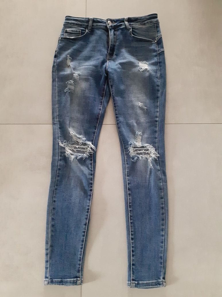 Spodnie damskie jeans z przetarciami