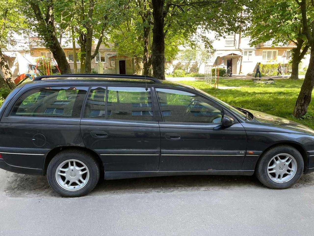 Opel Omega B (1998, 2.0 газ/бензин, універсал)