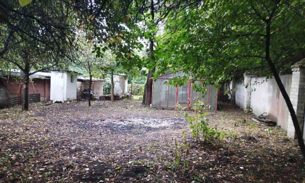 "1/2 частина будинку   з ділянкою і гаражем