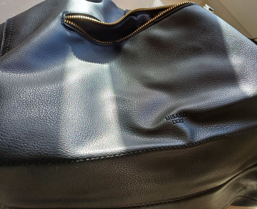 Mala de senhora Misako usada duas vezes