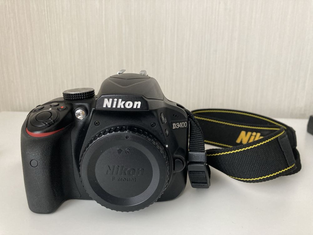 Conjunto Nikon d3400 + lente + flash