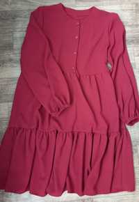 Сукня бордового кольору з воланами