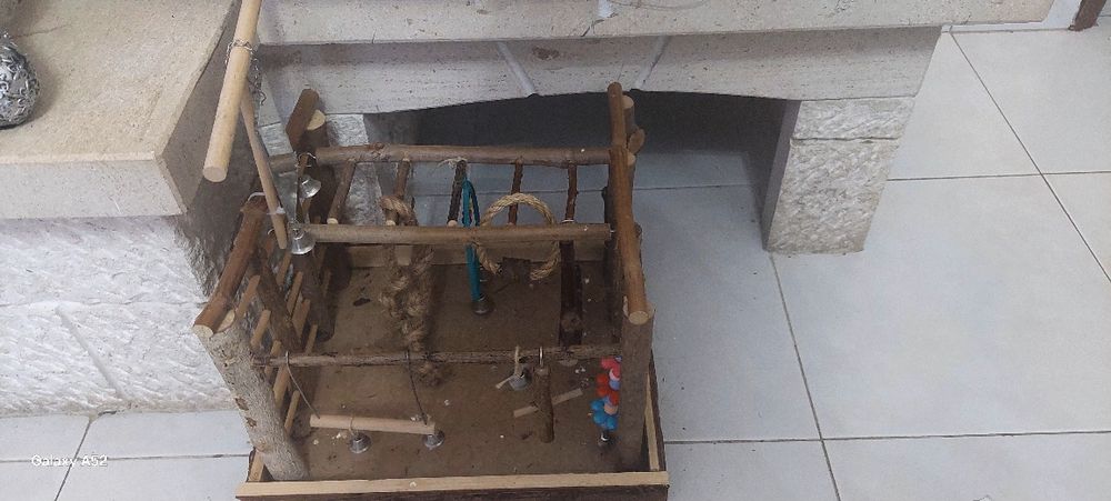 Brinquedo para pássaro