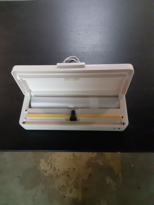 Máquina de fechar sacos de plástico