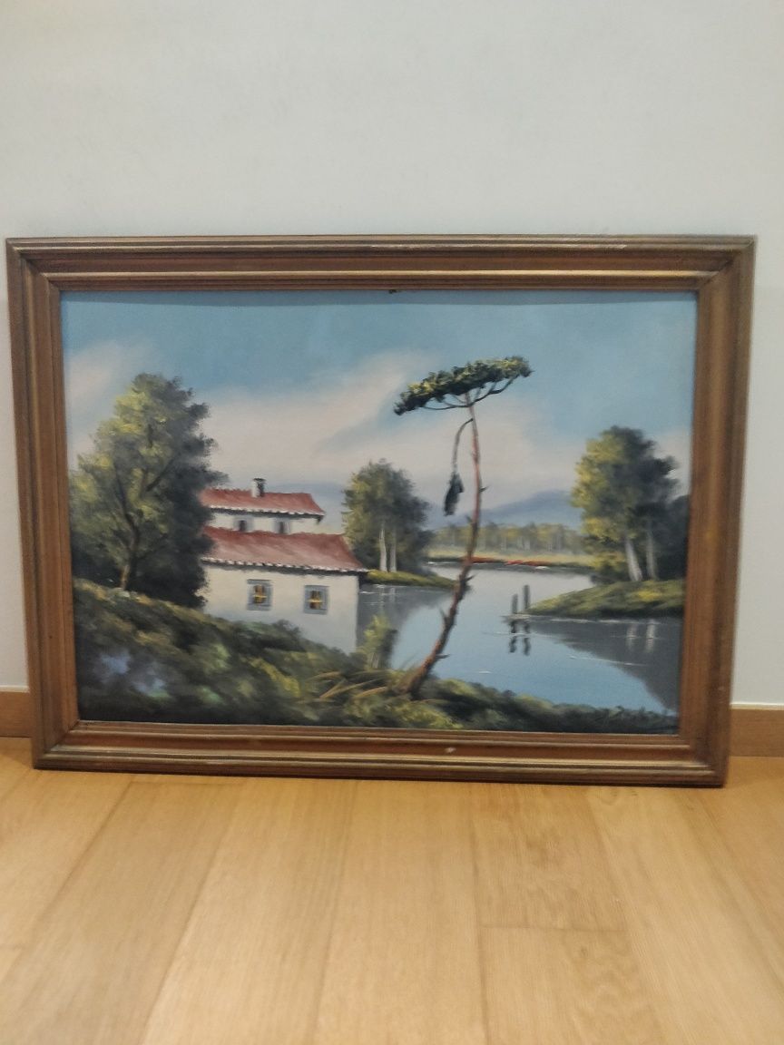 Quadro com paisagem.