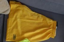 Żółte spodenki umbro M szorty