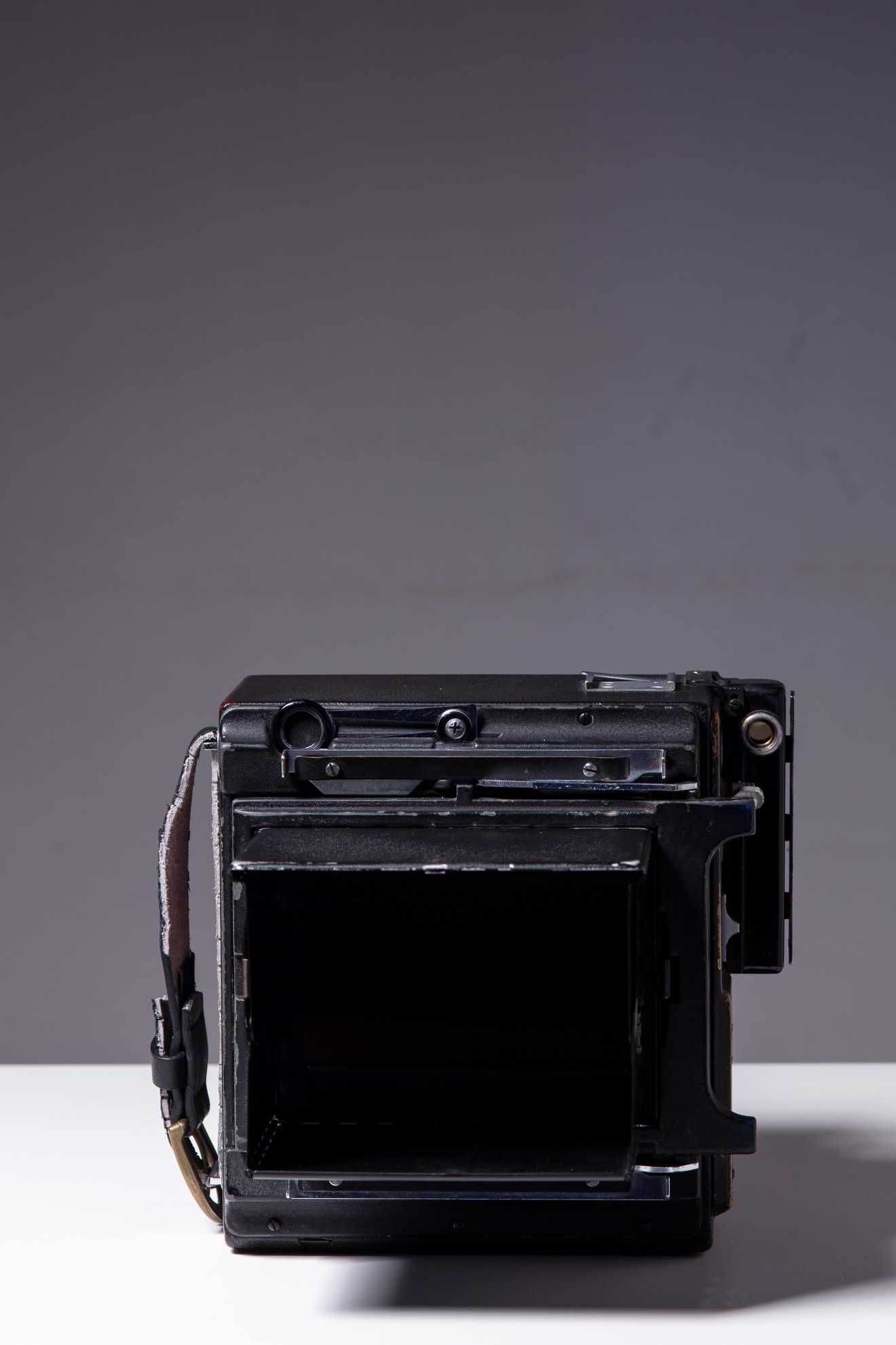 Camara 4 x 5" grande formato Graflex Speed Graphic - Optar 135mm F/4.7