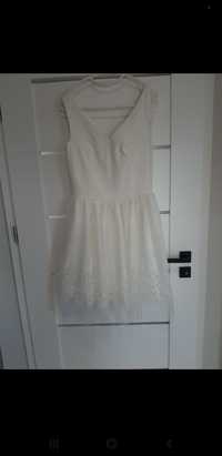 Biała  elegancka sukienka