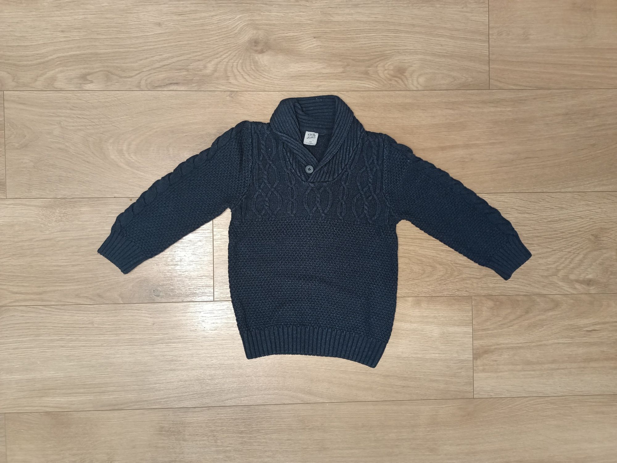 Granatowy sweterek 104