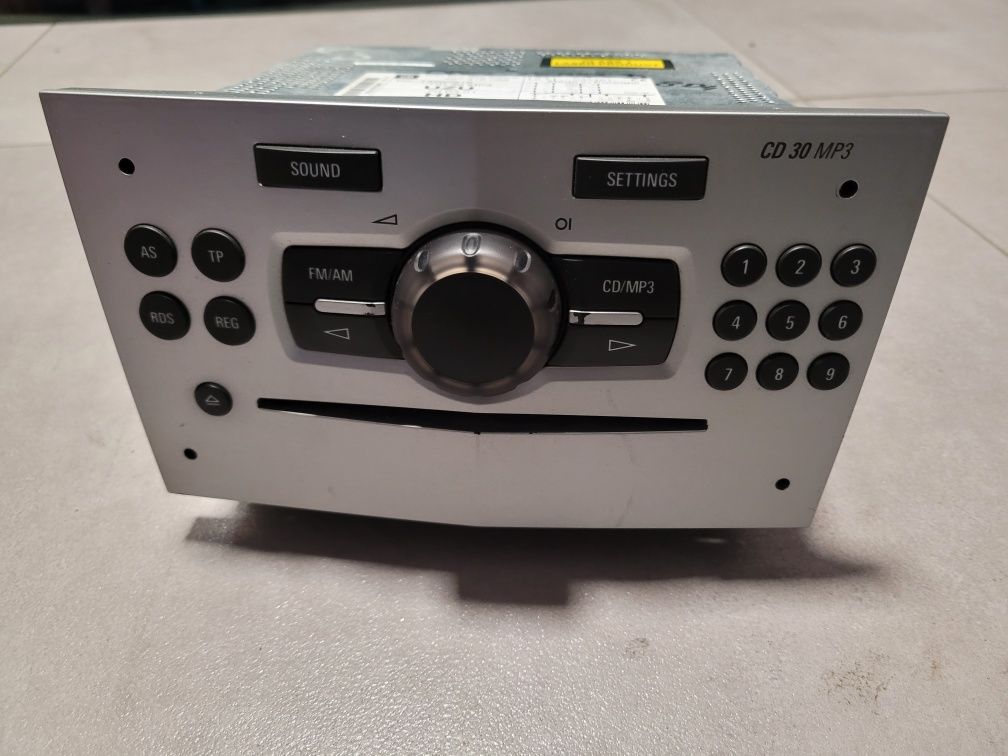Radio samochodowe fabryczne Opel Corsa D 497.316.088 złote srebrne