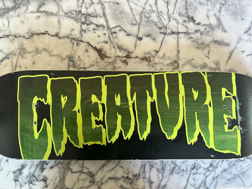 Tábua de skate da creature