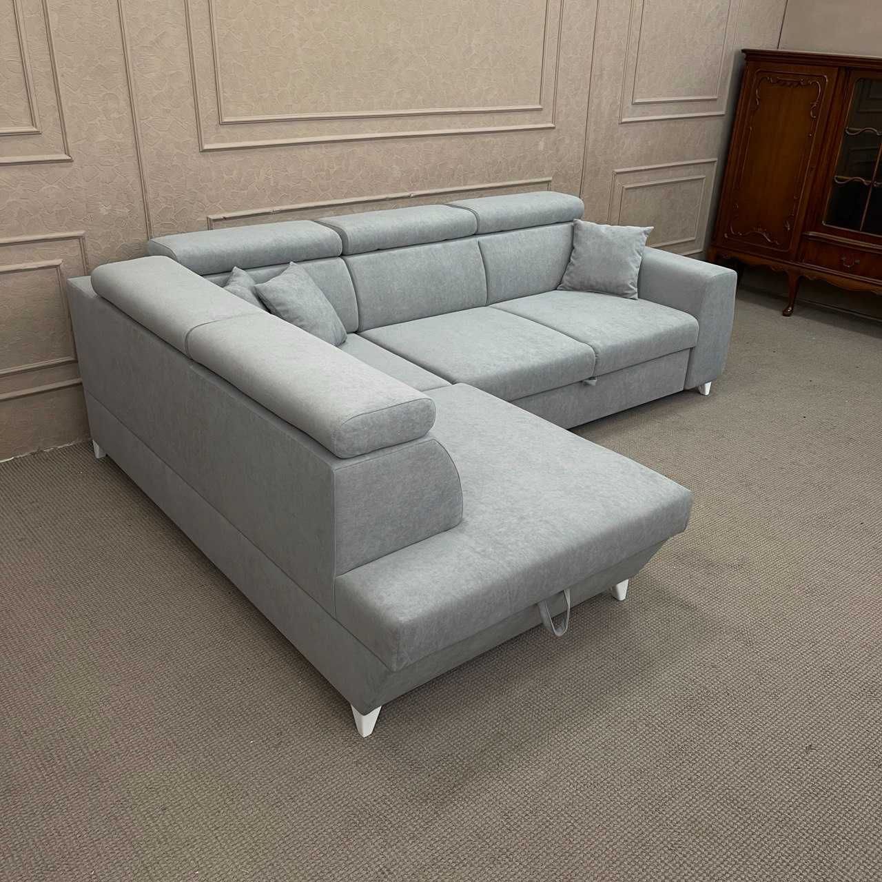 Новий кутовий диван в тканині купити