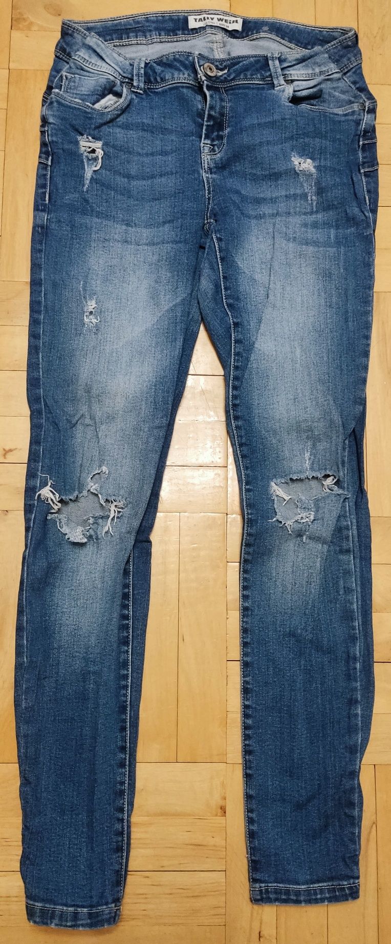 Spodnie jeansowe jeansy z przetarciami dziurami na kolanach