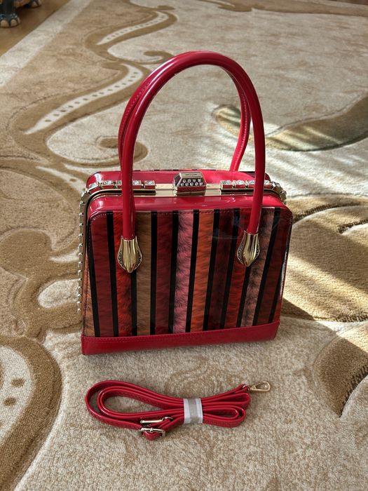 Дізайнерська сумка-саквояж з натуральноі шкіри