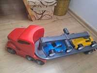 Zabawka transporter z dwoma autami i dźwignią