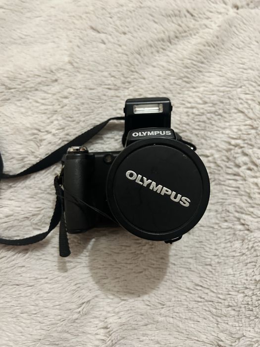 OLYMPUS Sp-8000UZ фотоаппарат