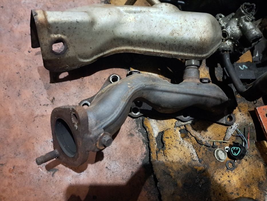 Лівий коллектор Mitsubishi Pajero Wagon 3/4