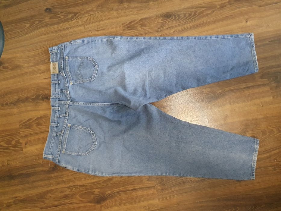 Жіночі джинси великого розміру