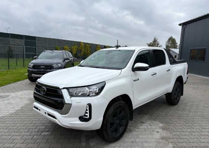 Разборка Toyota Hilux бампер двері фари крила скло капот  Шрот