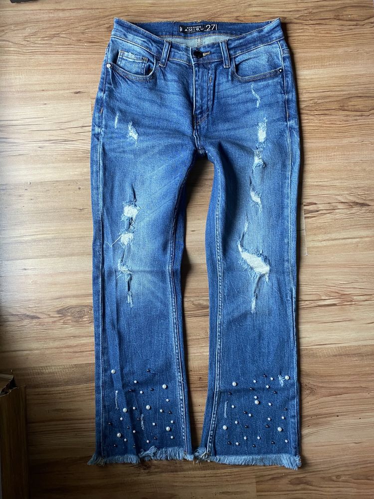 Amisu spodnie jeansy dzwony jak nowe S 36