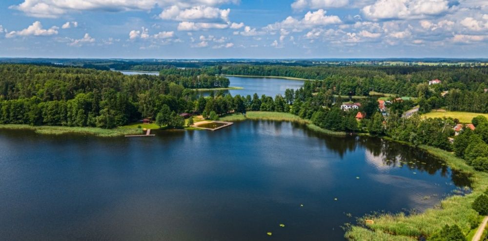 Działka nad jeziorem Domek Letniskowy pomost jacuzzi na Mazurach port