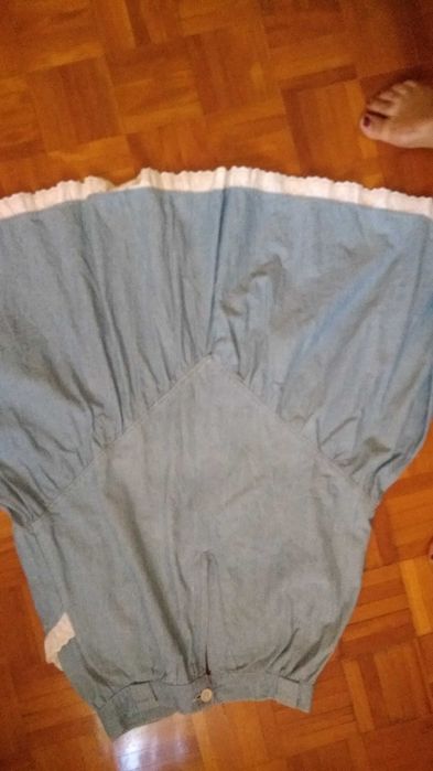 Bonita saia de ganga com aplicaçoes e bolsos