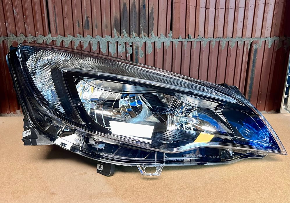 Astra J prawa lampa reflektor h7 Europa oem