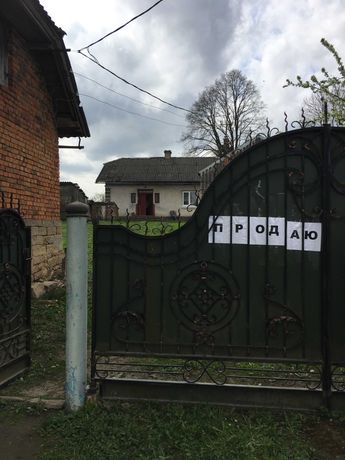 БУДИНОК -Хата в селі