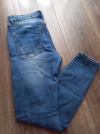 Jeansy Stradivarius High Waist rozmiar 38 wysoki stan dziury