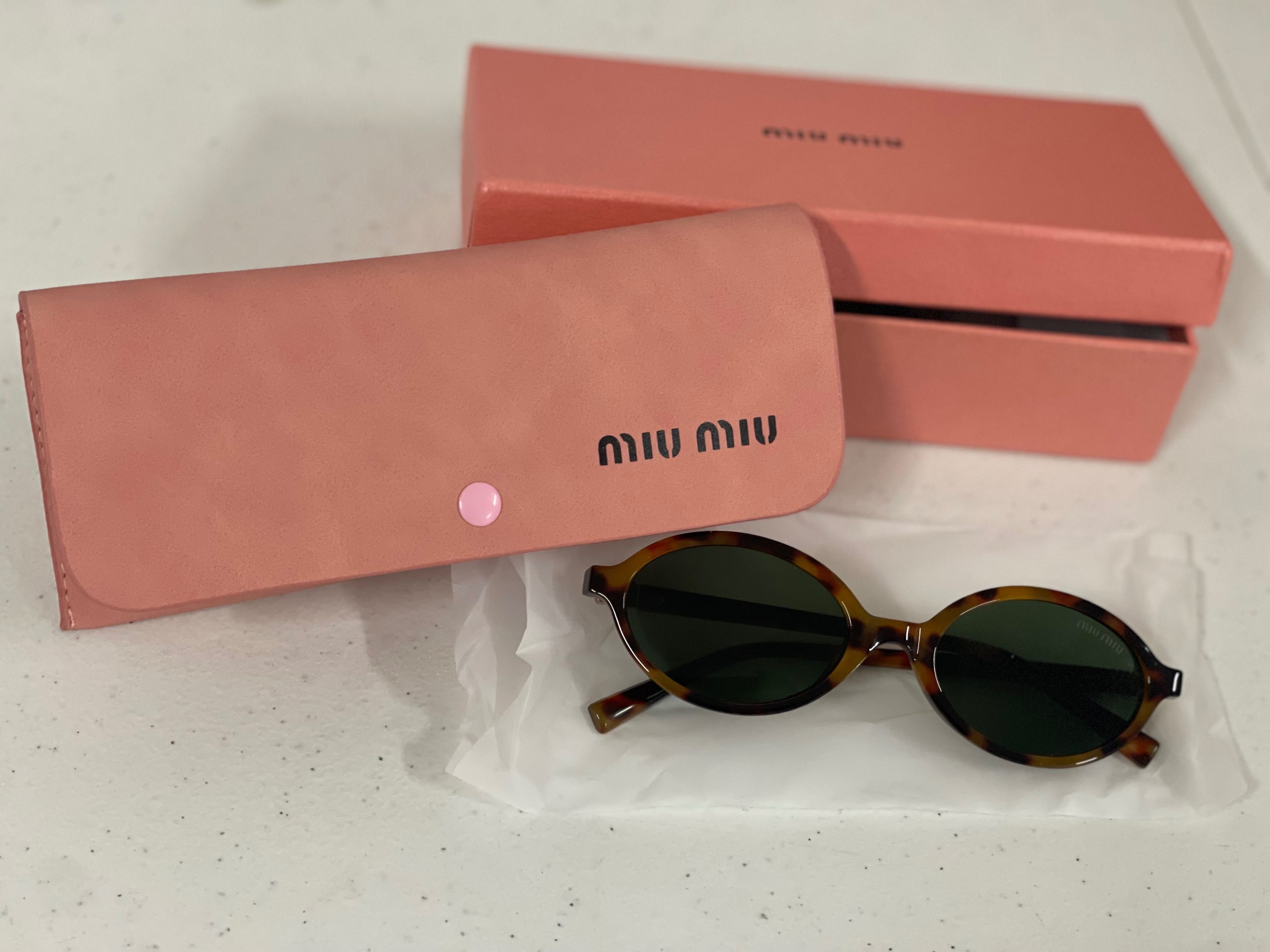 Óculos de sol miu miu