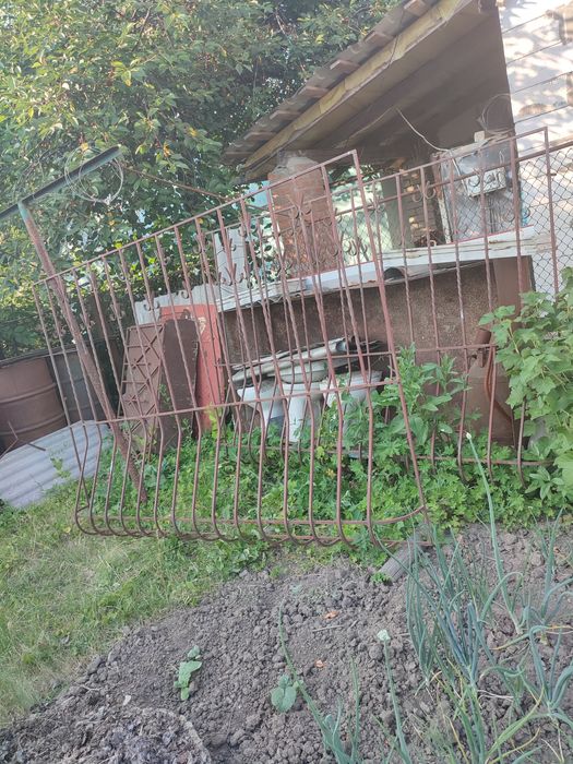 Решотки  (грати) кованые  на  окона