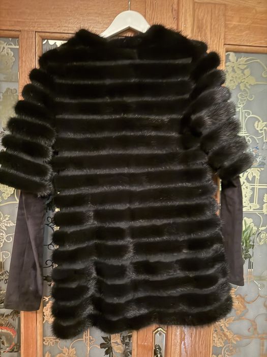 Продам меховую жилетку