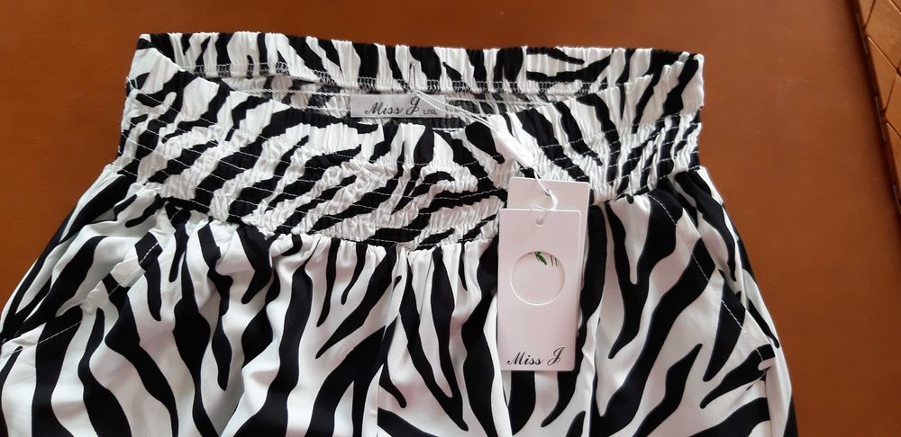 Eleganckie damskie spodnie 40 w zebrę ecru-czarne