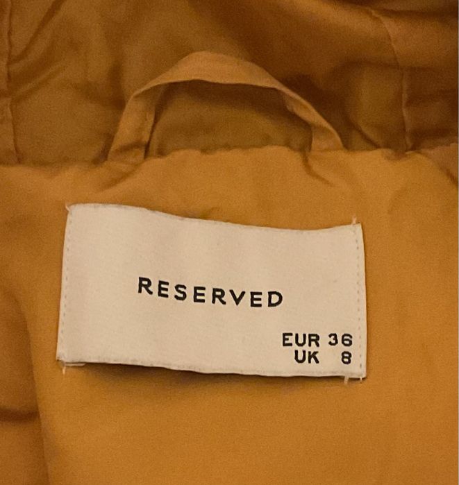 Damska zimowa kurtka żółta ocieplana Reserved