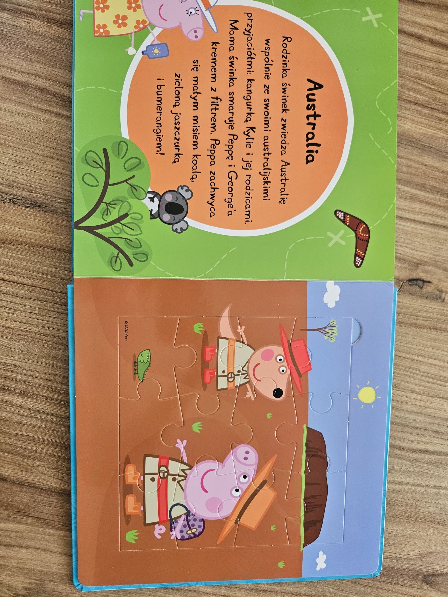 Ksiazka puzzlami peppa pig świat do odkrycia