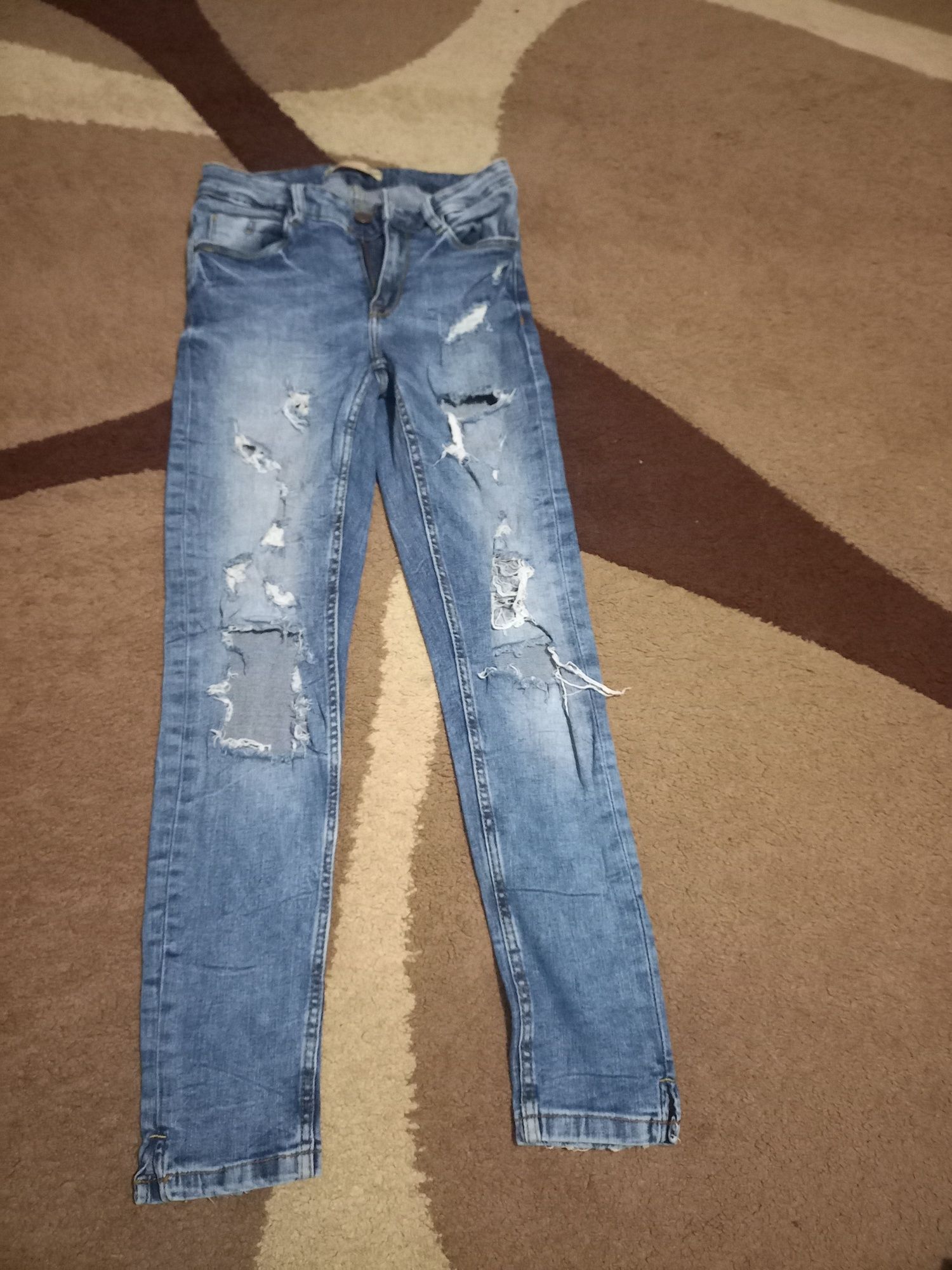 Spodnie jeansy 32