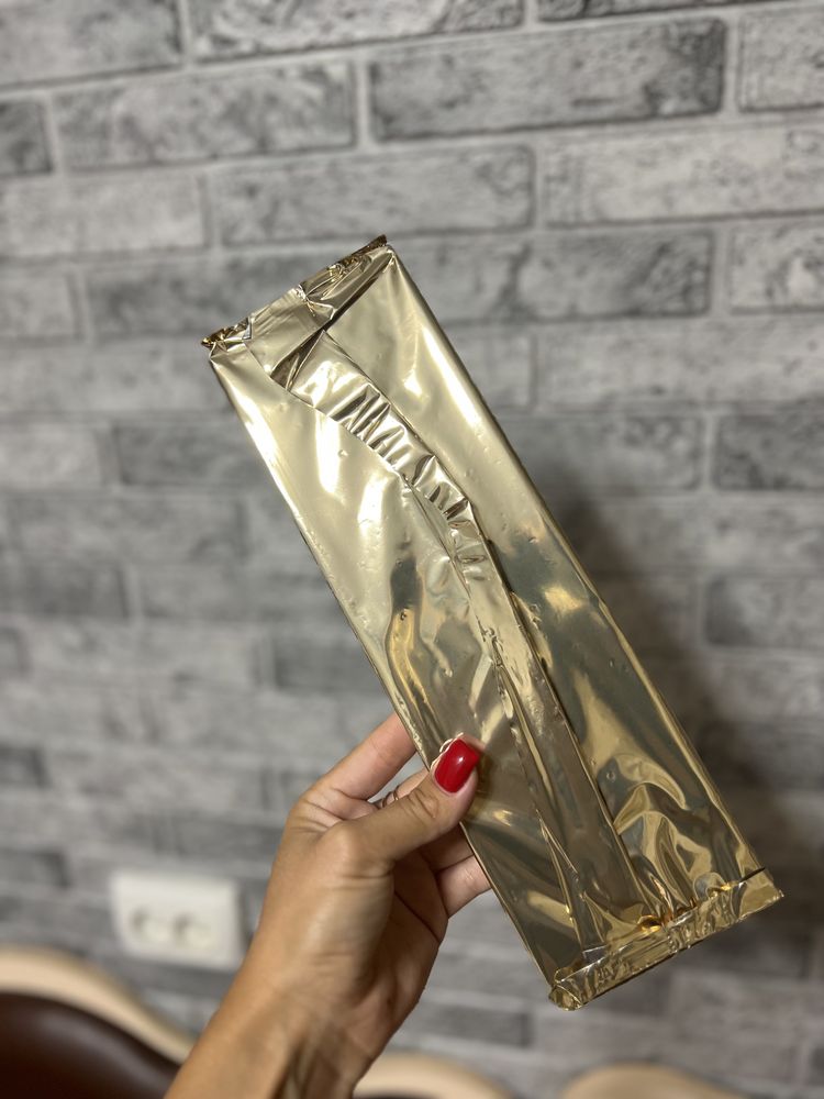 Шоколад Lindt Лінд молочний з горіхами та родзинками 225грам