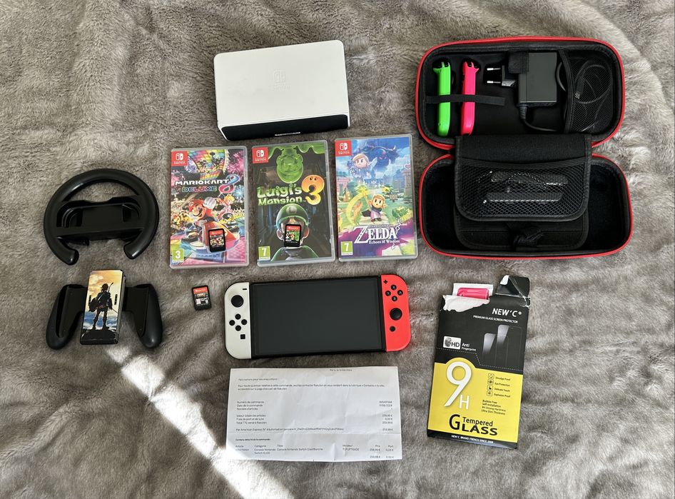 Nintendo Switch OLED + 4 gry + akcesoria + gwaranacja