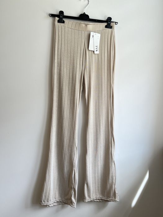 Legginsy damskie cienkie prążek dzwony