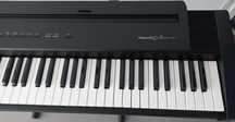 Piano portátil, com 88 teclas  Roland Ep-9, em  óptimo estado.