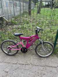Rozowo/fioletowy rower