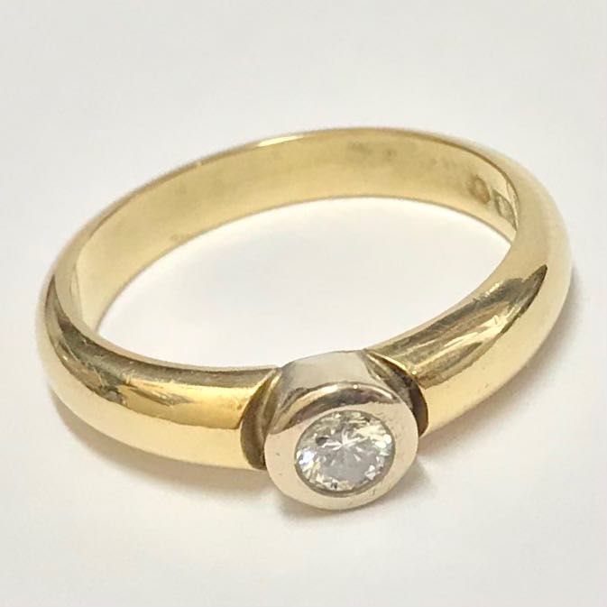 Złoty pierścionek ZARĘCZYNOWY z BRYLANTEM 0.24c 16