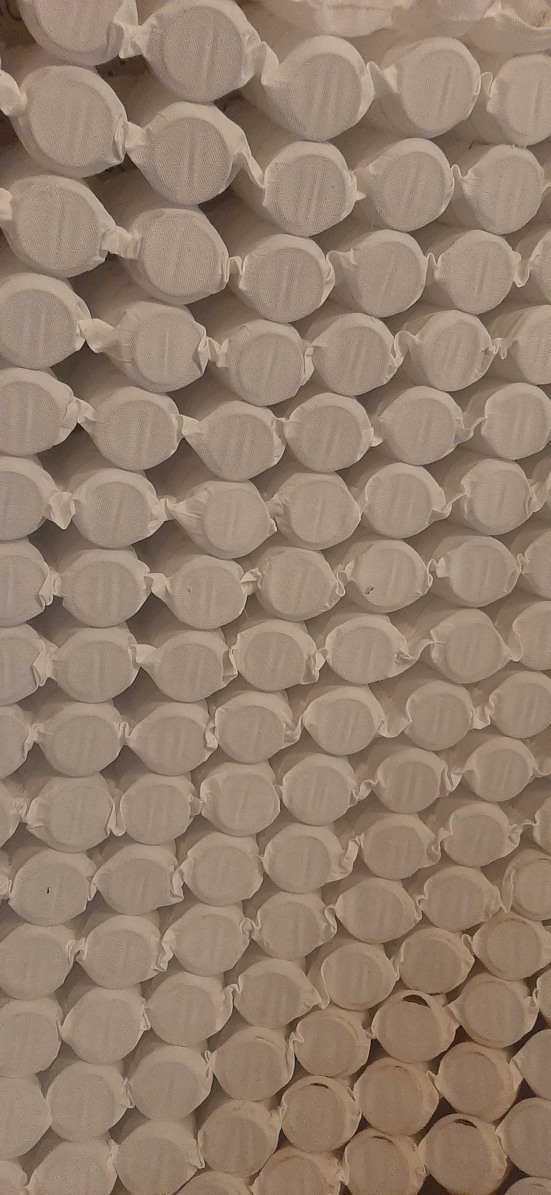 Sprężyny tapicerskie w otulinie z materiału śr 6 cmx15cm wysokość
