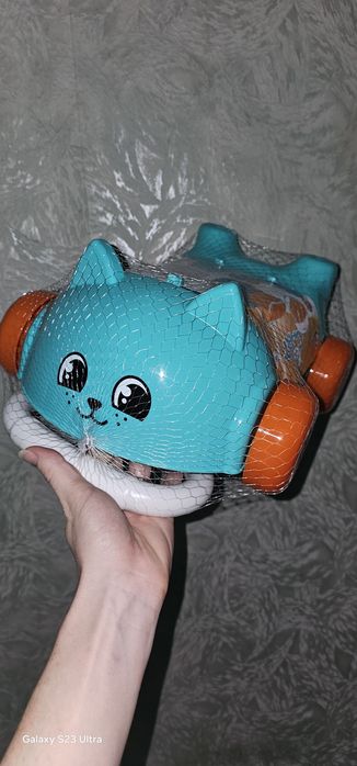 Дитяча іграшка Technok Візочок Котик помаранчево-бірюзовий, від Зроків